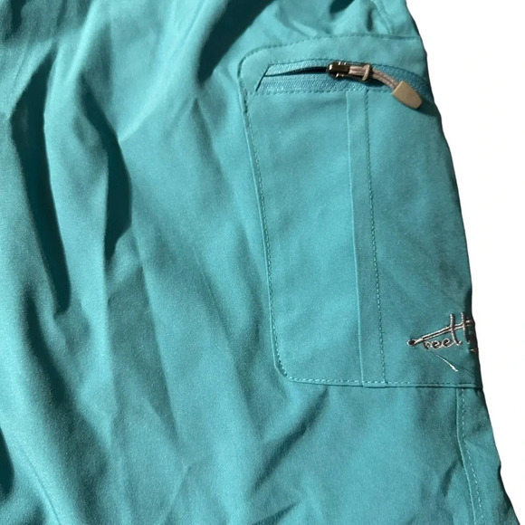 Reel Life men's mesh lined teal shorts size medium, with zip pocket on side - Picture 3 of 4